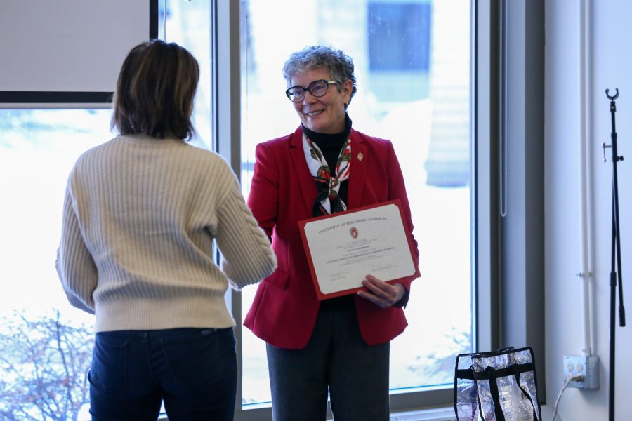 Interim Dean Zahner presents a Psychiatric Mental Health Certificate student with their certificate of completion at the School of Nursing Winter Graduation Celebration, December 2025.