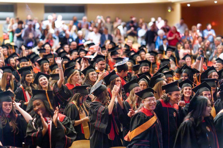 Graduates celebrate at the BSN Graduation Celebration, May 2026, with the UW-Madison song Varsity!.