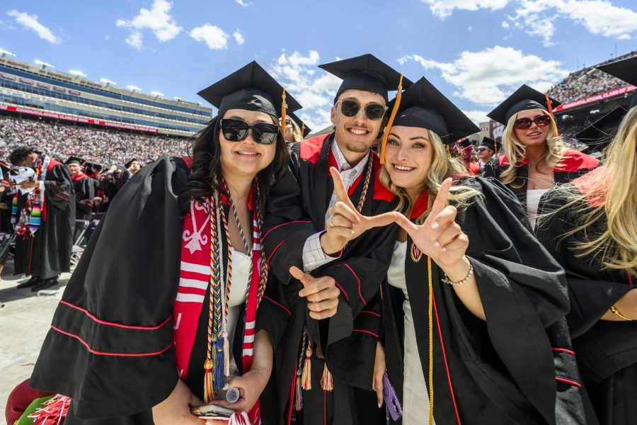 A group of three BSN graduates at UW-Madison Spring Commencement 2026.